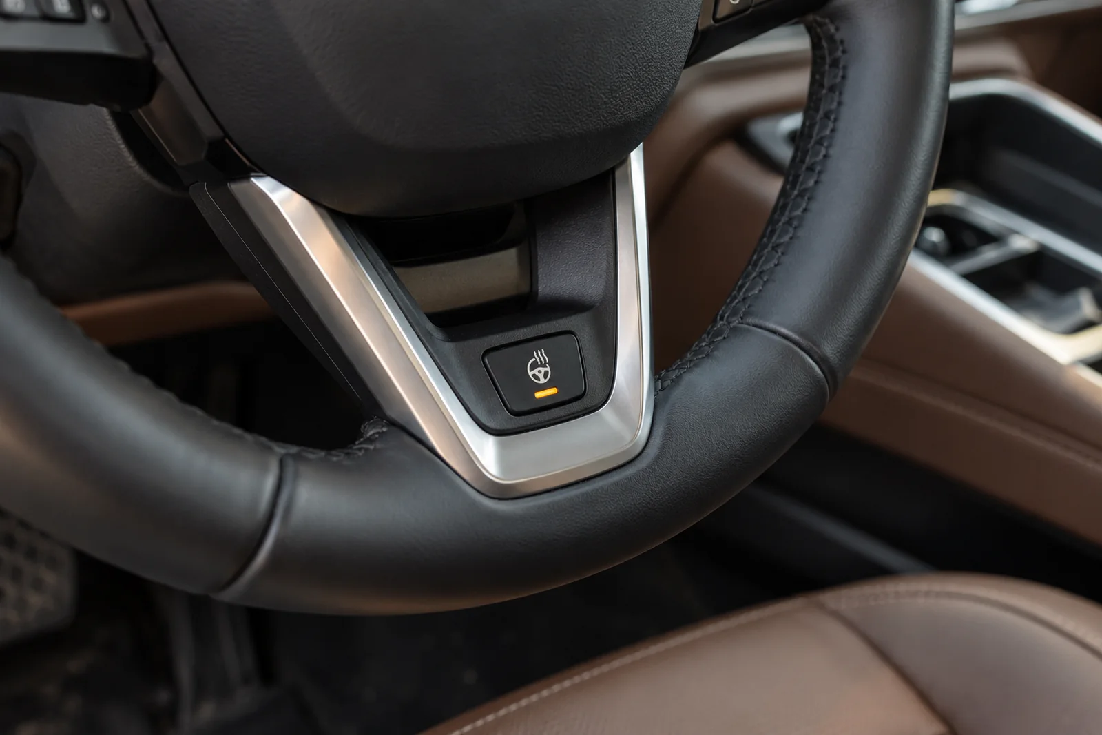 Иллюстрация: клавиша подогрева руля, BMW X1
