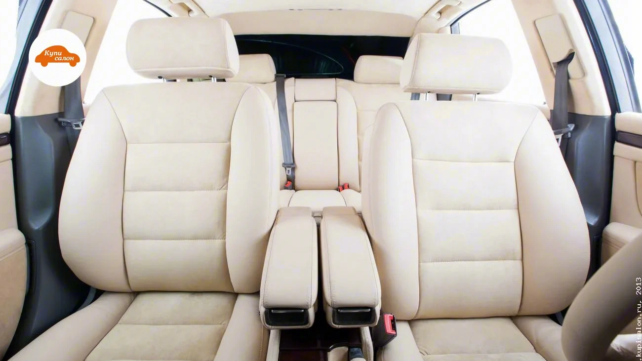 Audi A8 — Перетяжка салона бежевой кожей и алькантарой, вид сзади