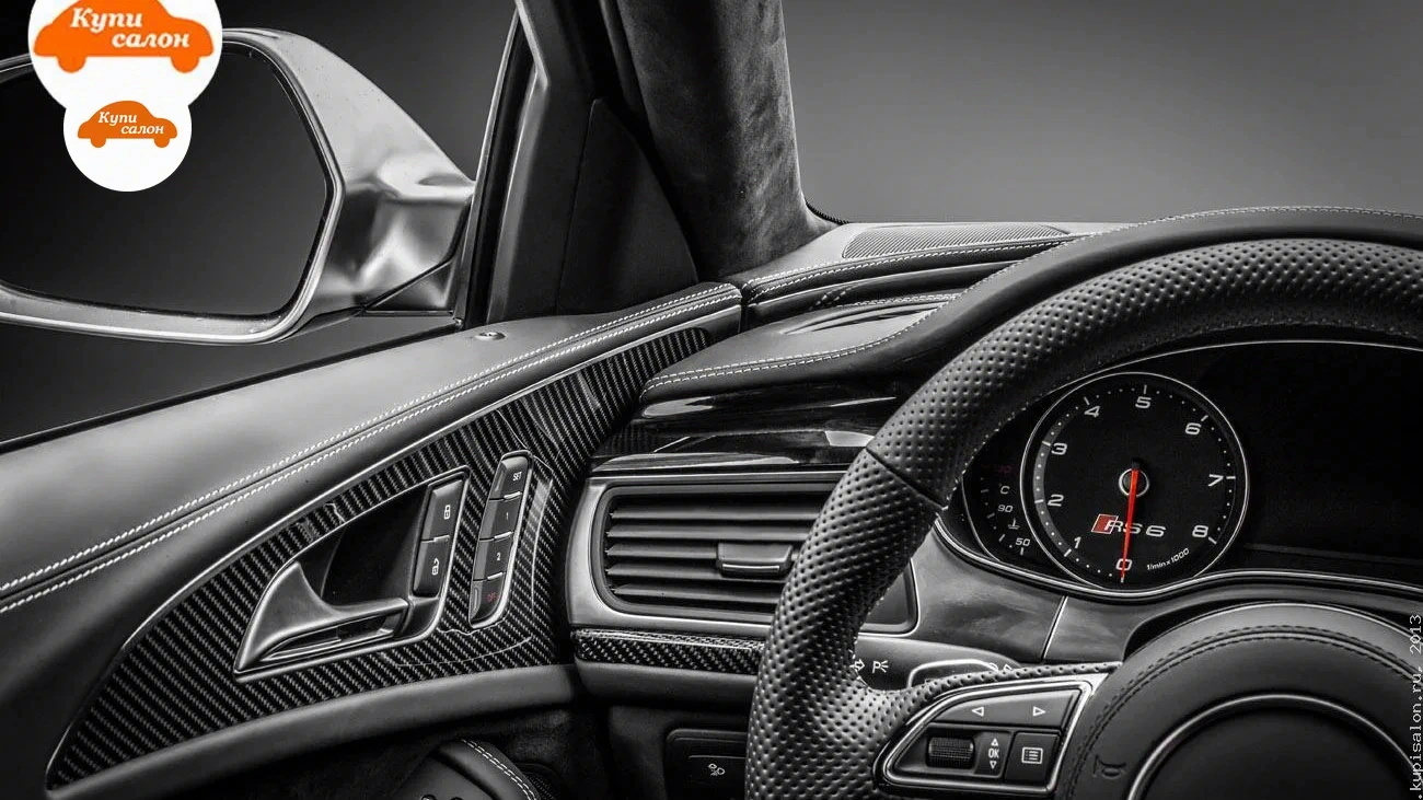 Audi RS 6 — Интерьер Audi RS6 с перетянутым рулем, дверными картами и карбоновыми вставками