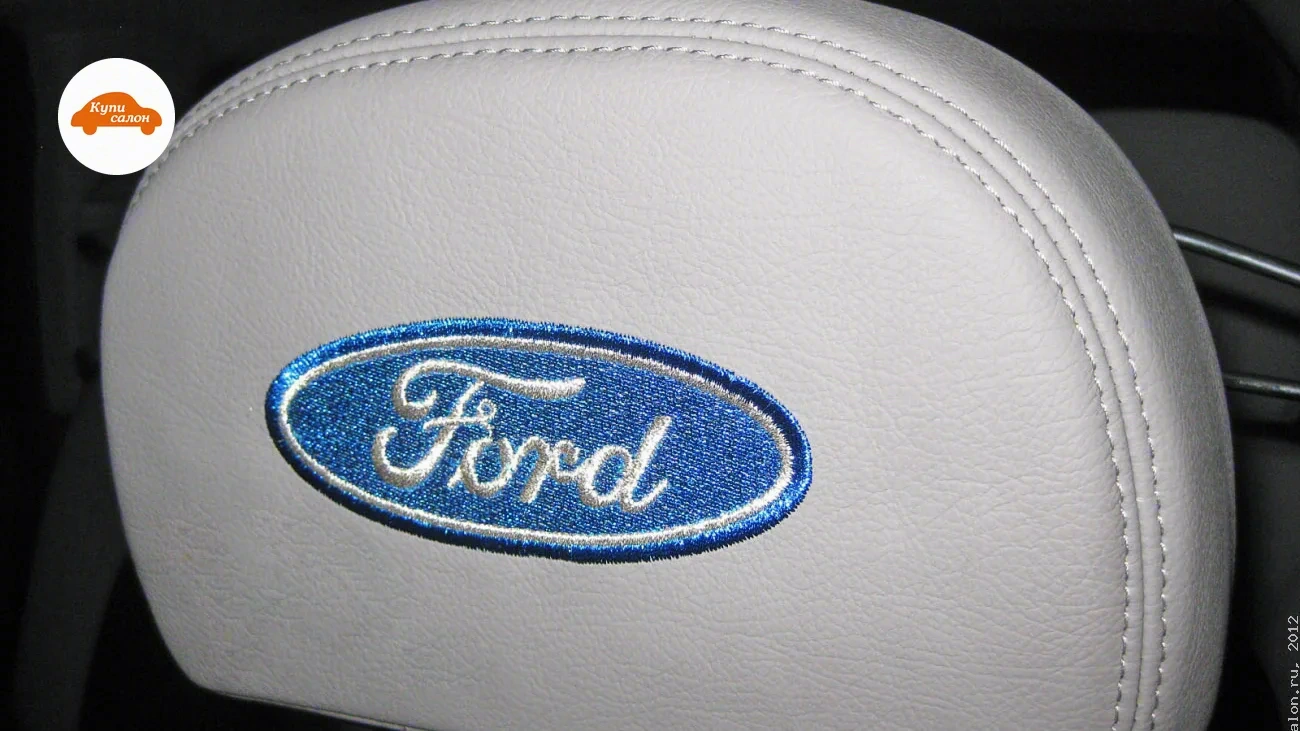 Ford Explorer — Перетяжка подголовника экокожей с вышивкой логотипа Ford