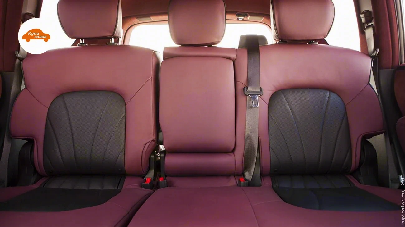 Infiniti QX56 — Перетяжка заднего ряда сидений в бордовую кожу с черной перфорацией