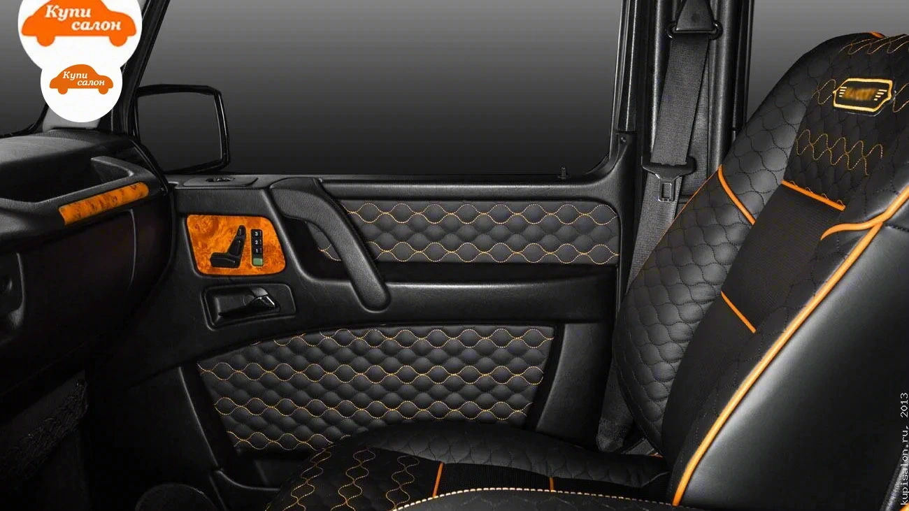Перетяжка салона Mercedes-Benz G-Class: сиденья и дверные карты черной кожей с оранжевой строчкой