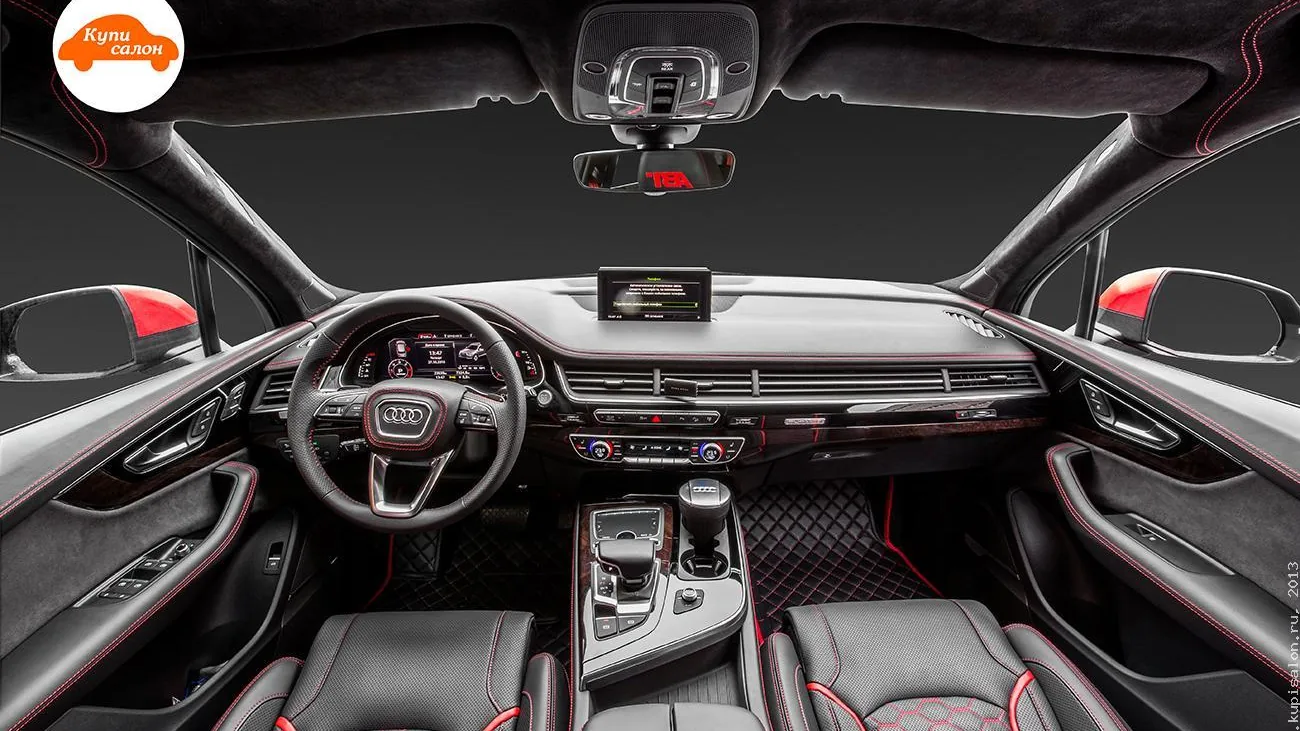 Перетяжка салона Audi Q7, черная кожа с красной строчкой и сотами, черные коврики ромб