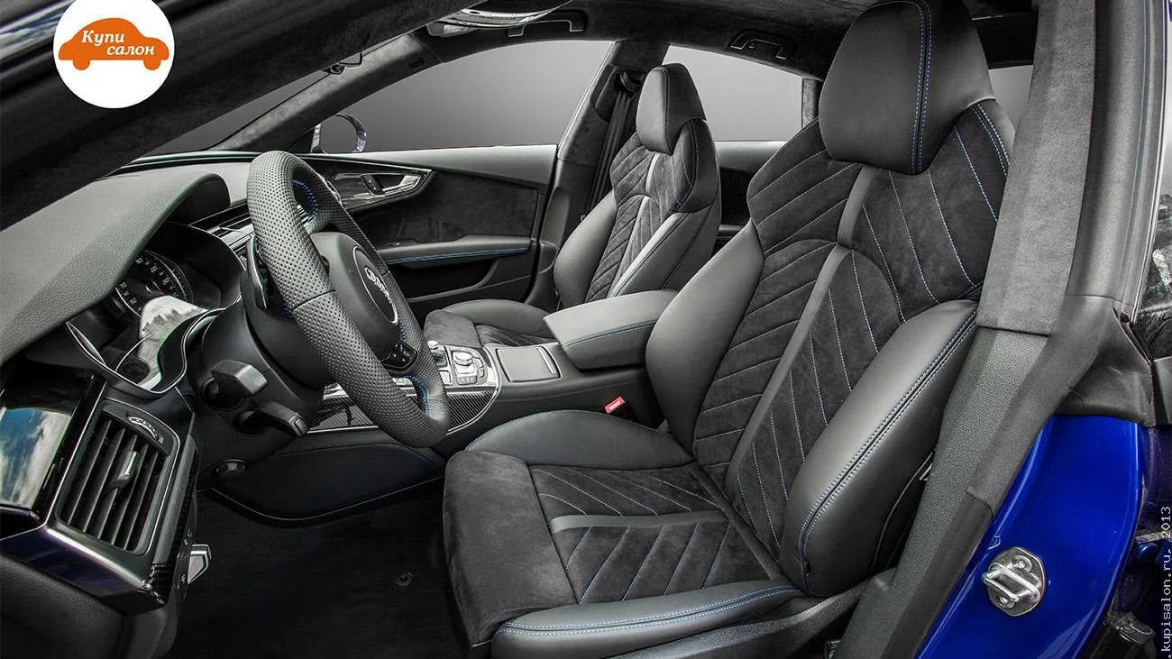 Перетяжка салона Audi в черную алькантару и кожу с синей строчкой, включая сиденья, руль, потолок и дверные карты