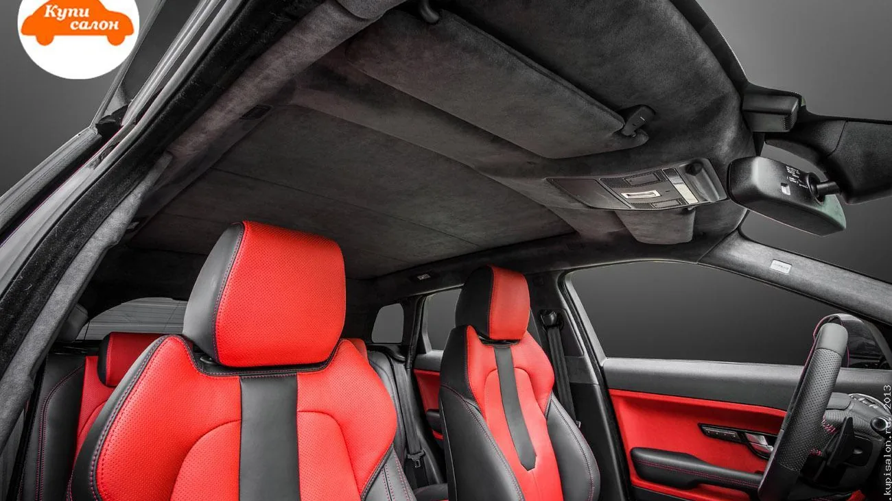 Перетяжка салона Range Rover Evoque: сиденья, дверные карты, потолок в красно-черную кожу и алькантару