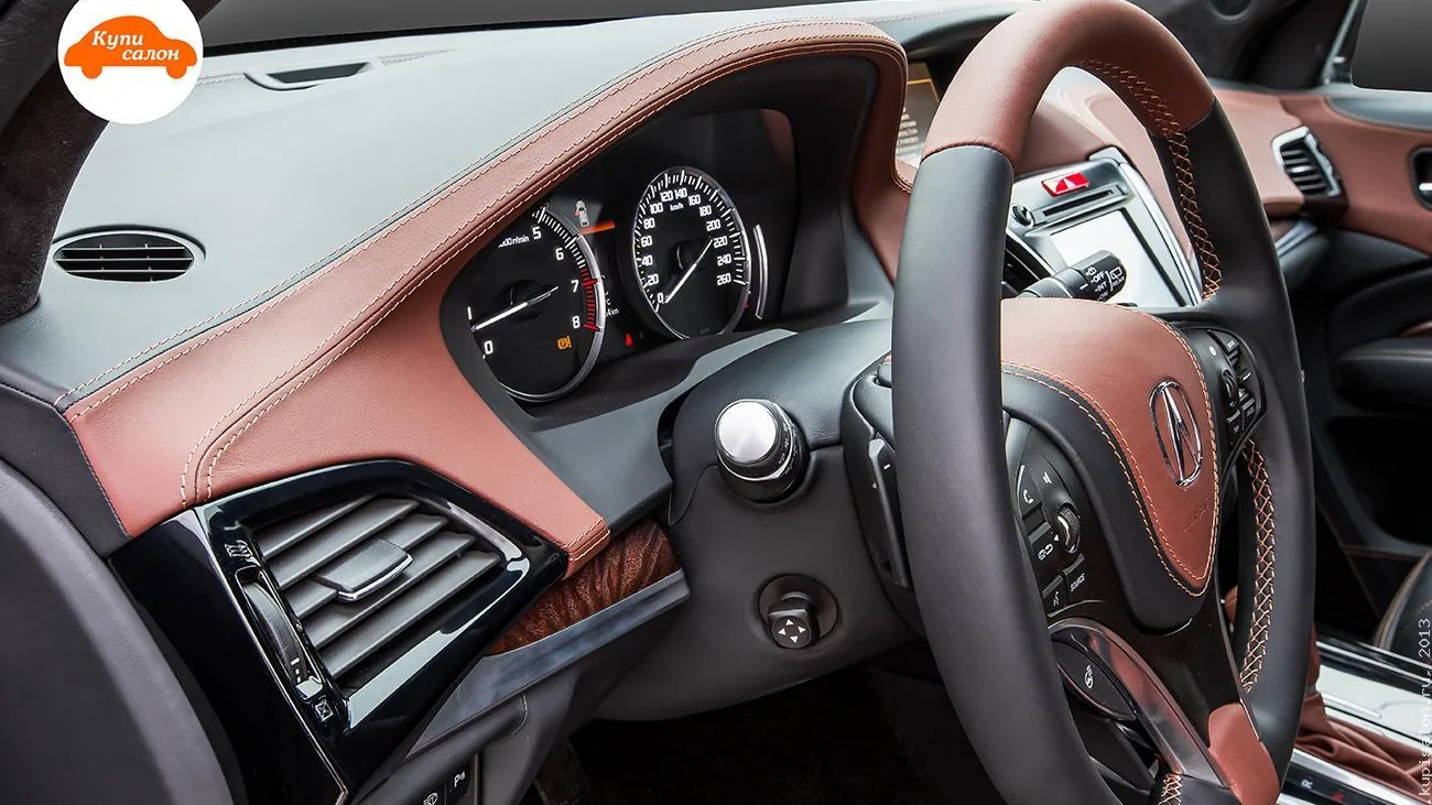Перетяжка руля и верхней части торпедо в коричневую и черную кожу с контрастной строчкой
