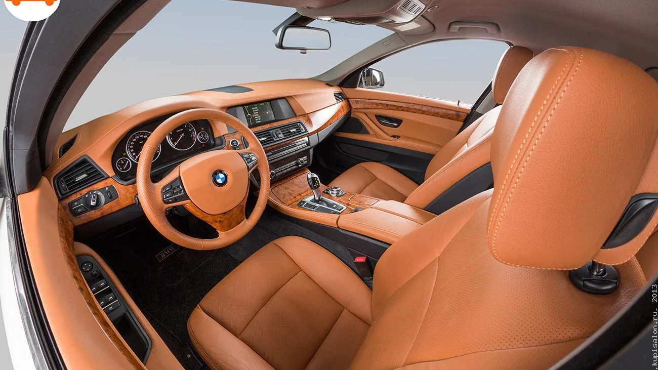Перетяжка салона BMW, коричневая кожа с перфорацией, деревянные вставки