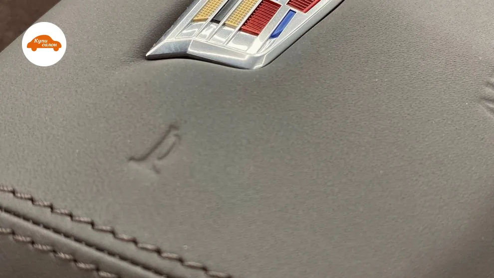 Перетяжка руля Cadillac, серая кожа с декоративной строчкой