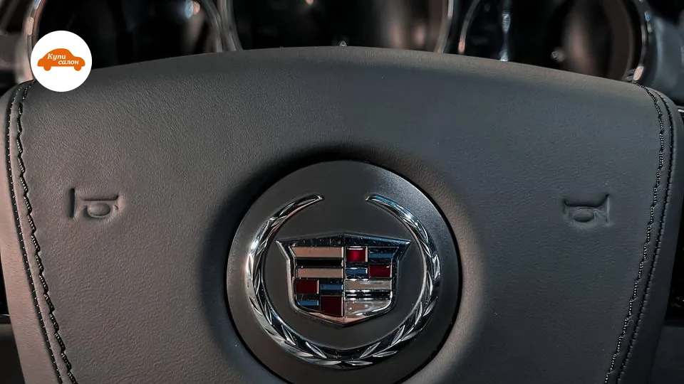 Перетяжка руля Cadillac в черную кожу с декоративной строчкой