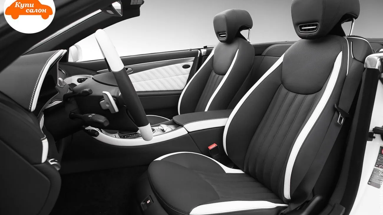 Перетяжка салона Mercedes-Benz SL-Class в черно-белую кожу с ромбовидной строчкой и перфорацией