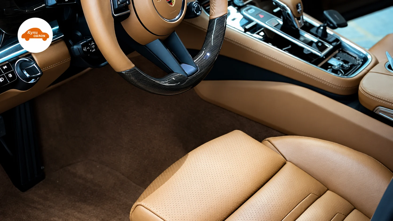 Перетяжка салона Porsche Panamera в коричневую кожу с перфорацией и карбоновыми вставками на руле