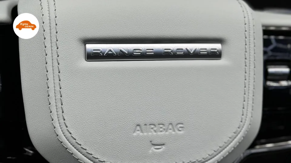 Подушка руля с надписью Range Rover: светлая кожа и двойная строчка по контуру