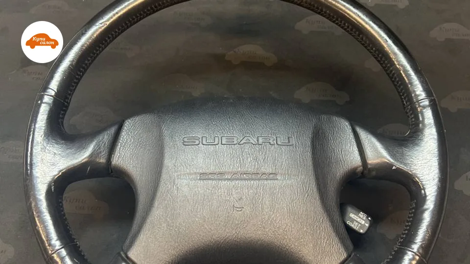 Перетяжка руля Subaru, черная кожа, декоративная строчка