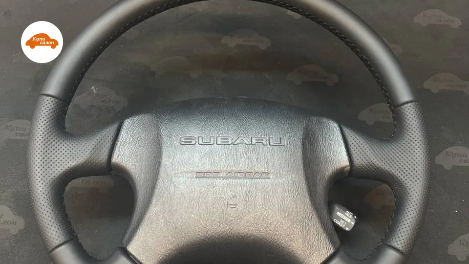 Перетяжка руля Subaru черной кожей с перфорацией