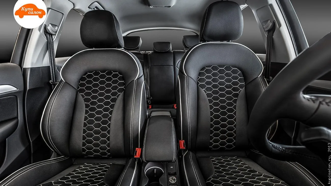 Перетяжка сидений Audi Q3 черной кожей с белой строчкой и сотами, центральный подлокотник, подголовники.