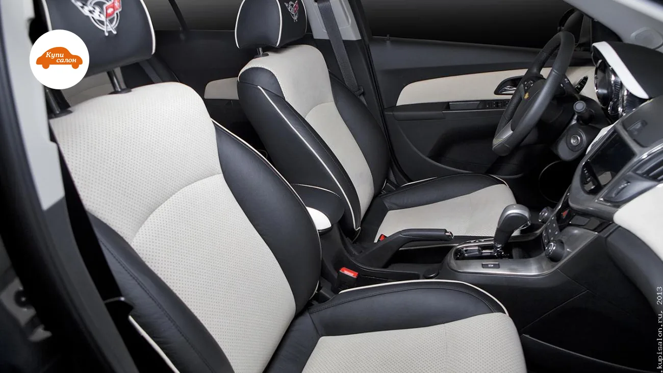 Перетяжка сидений и подголовников Chevrolet Cruze в черную и бежевую экокожу с перфорацией и вышивкой