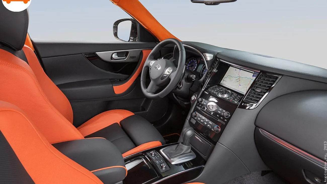 Перетяжка салона Infiniti: сиденья, потолок, стойки, дверные вставки, центральный подлокотник в оранжевой и черной коже