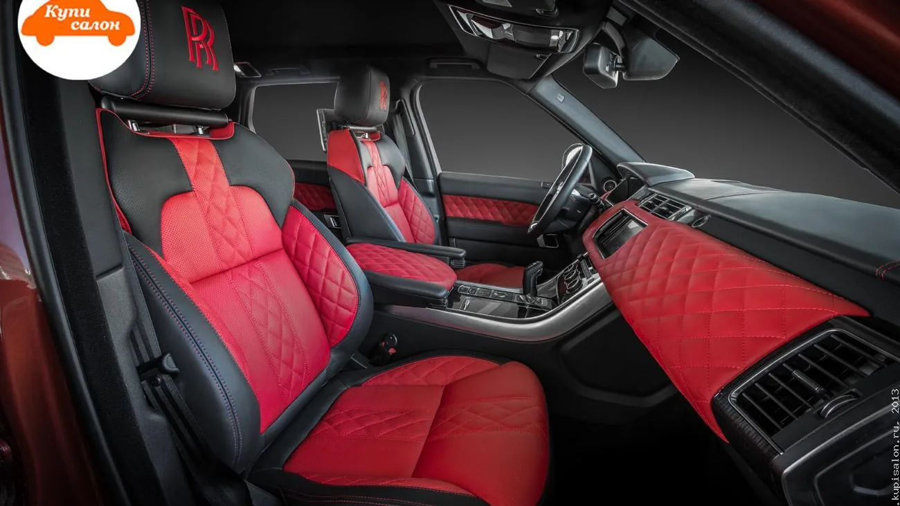 Перетяжка салона Range Rover Sport в красно-черную кожу с ромбовидной прострочкой и вышивкой RR на подголовниках.