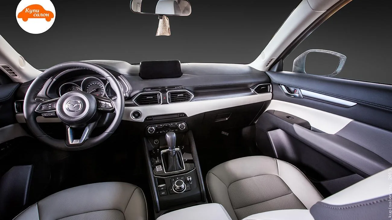 Перетяжка сидений Mazda CX5 — общий вид переднего салона с заднего ряда