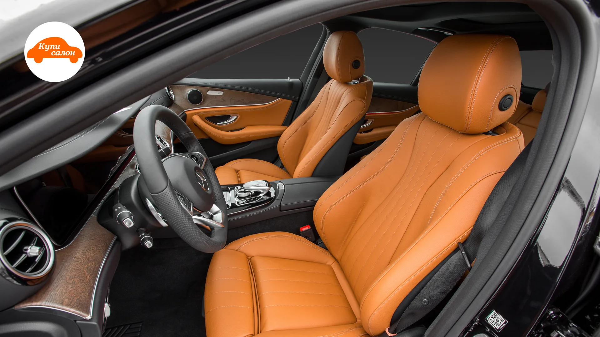 Перетяжка сидений Mercedes-Benz E-Class — передняя часть салона через водительскую дверь
