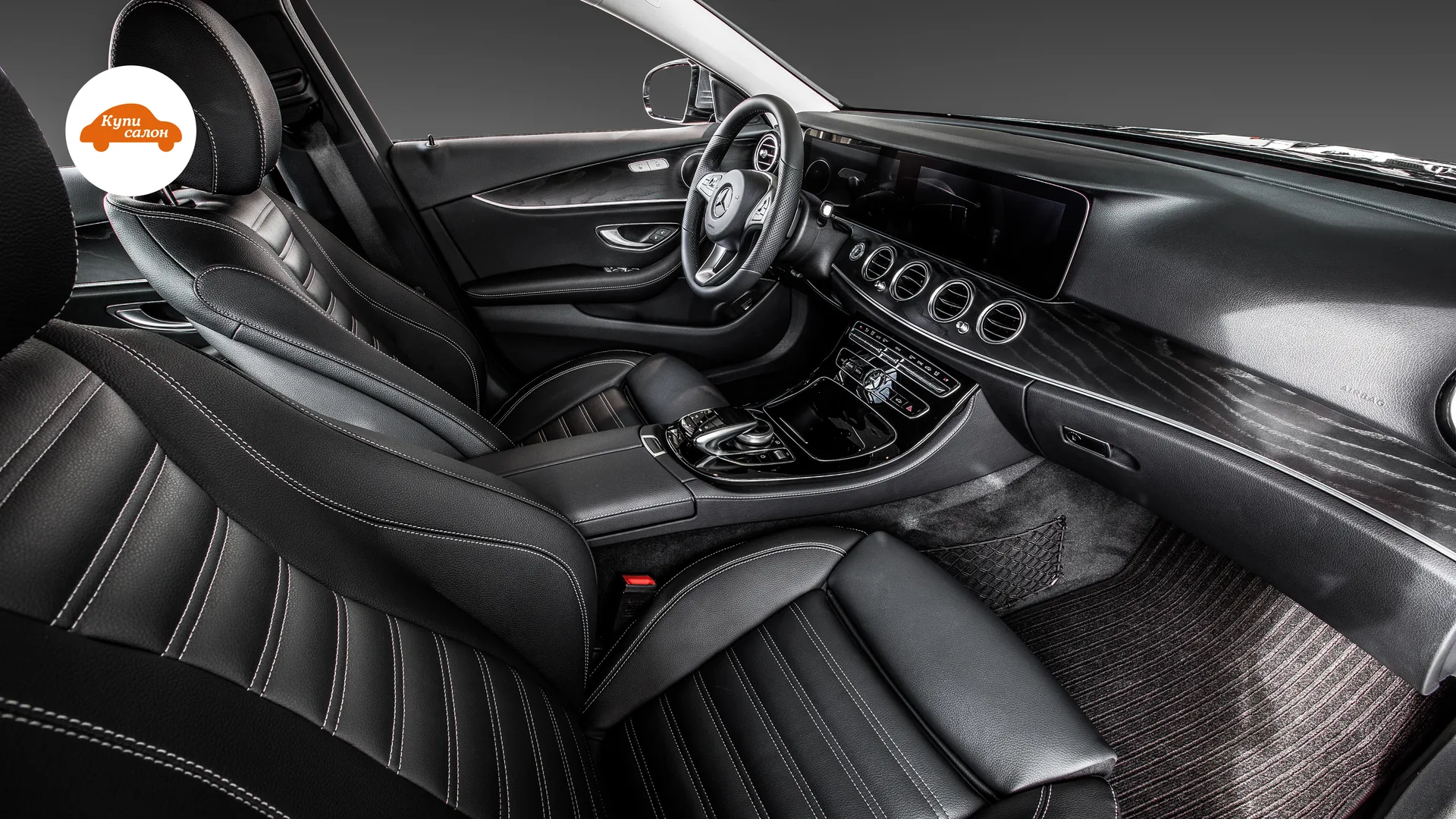 Перетяжка сидений Mercedes-Benz E-Class — общий вид переднего салона со стороны пассажира