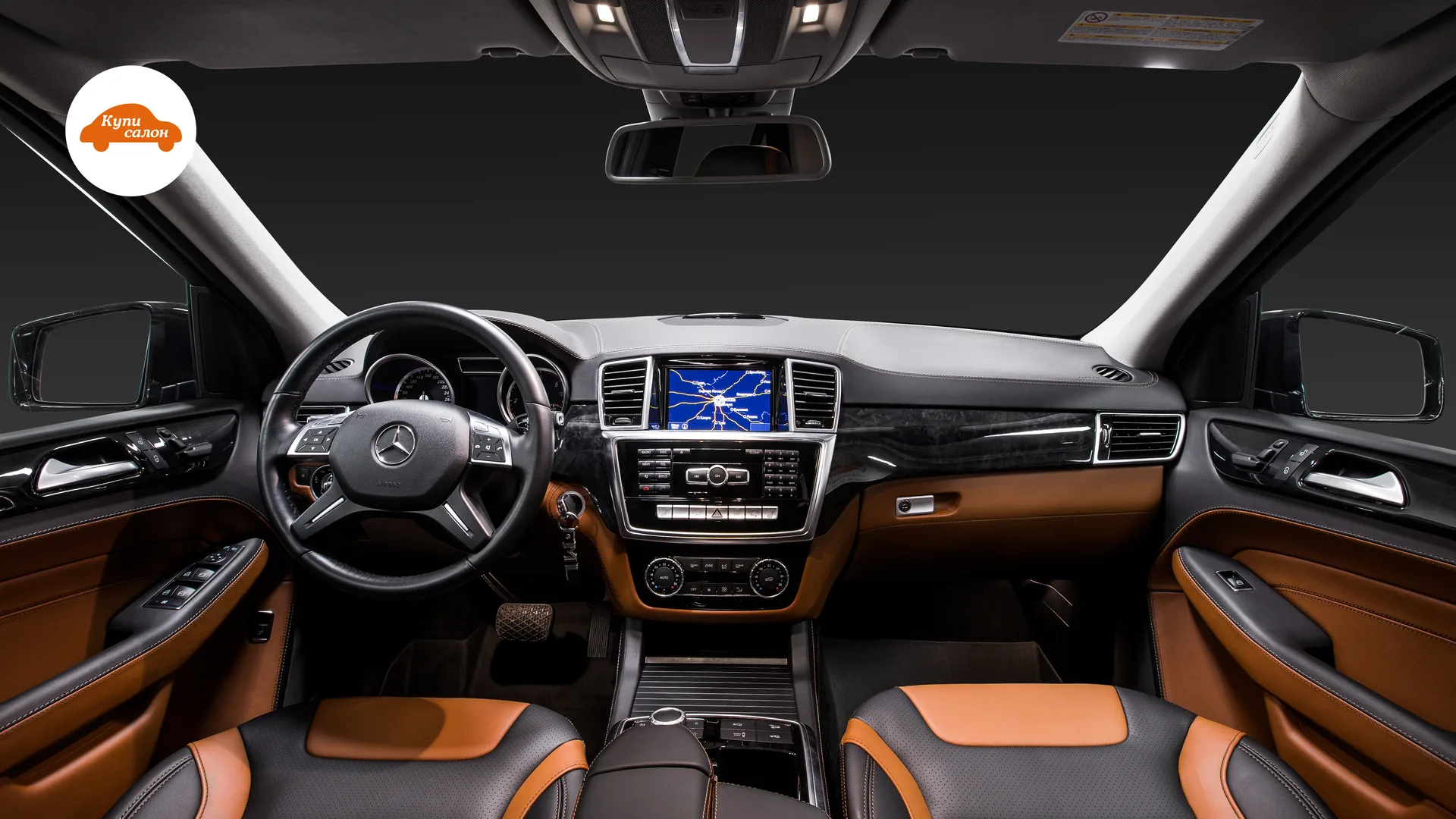 Перетяжка салона Mercedes-Benz Gl — общий симметричный вид переднего салона с заднего ряда