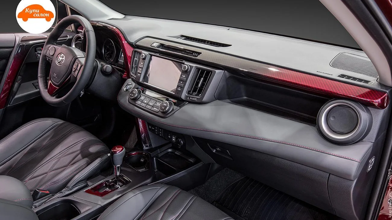 Перетяжка салона Toyota RAV4: черная кожа, серый пластик, красный карбон, красная строчка.