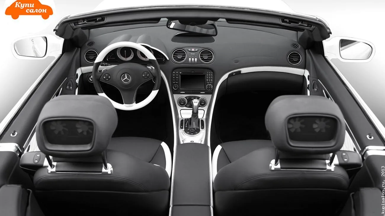 Перетяжка салона Mercedes-Benz SL-Class в черную кожу с белыми вставками, руль и сиденья